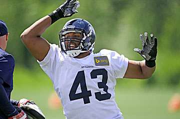 Another gem in Seattle? Between his NFL bloodlines, Texas pedigree and Pete Carroll's praise, Jeffcoat is a name to remember this summer. (Elaine Thompson/AP)